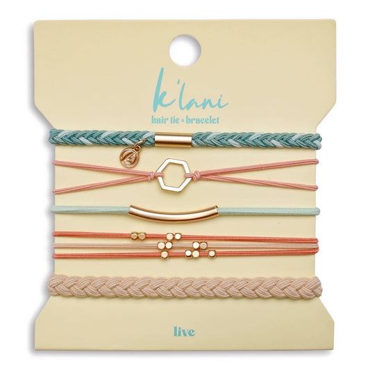 Set of hair ties and bracelets on a 'klari' branded card
